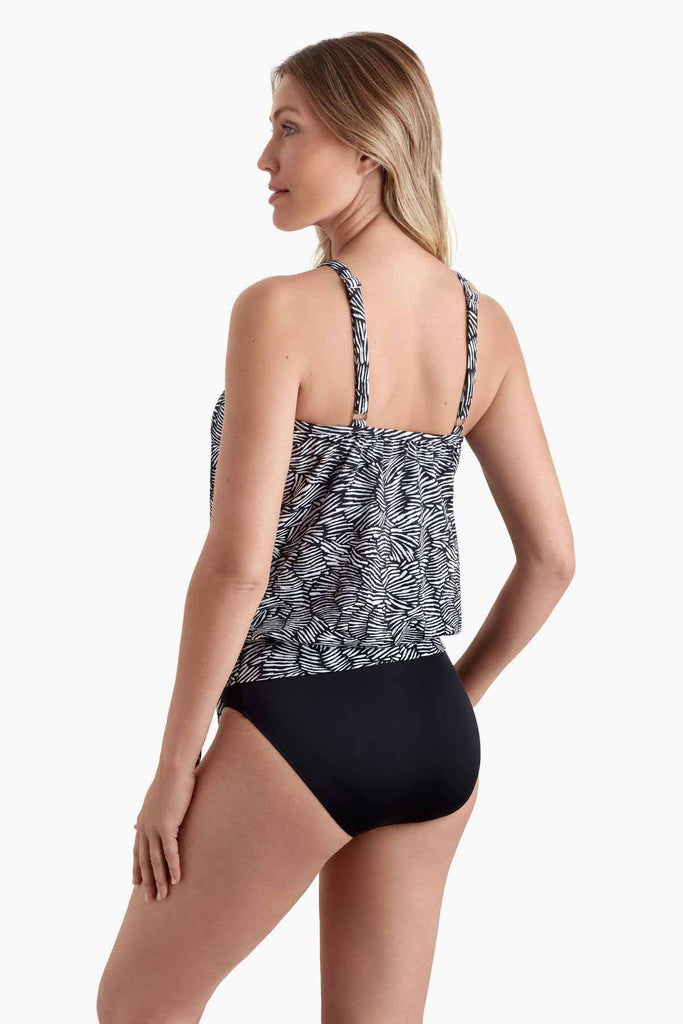 Woman turned left to show off pattern detail