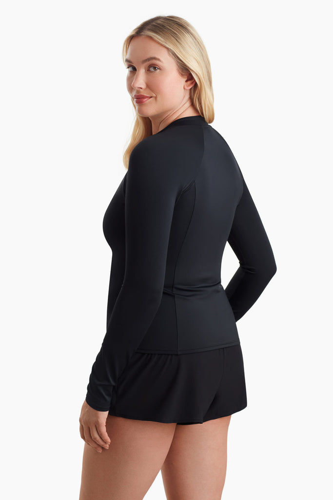 Woman faced left to show detail of the sun shirt